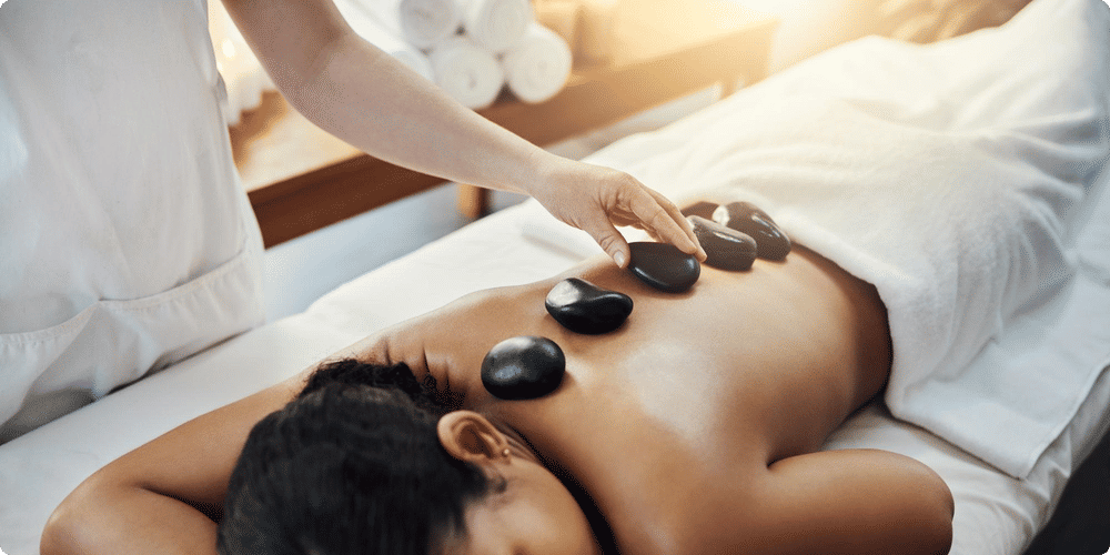 Comment un massage chauffant peut soulager la douleur ?